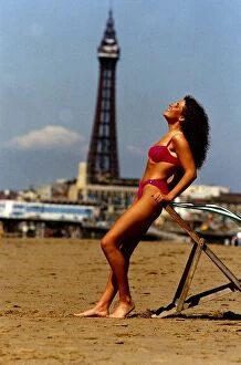 Images Dated 27th August 1992: Bathing Girls on holiday in Blackpool Leaning aginst deck chair August 1992
