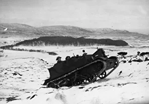 01445 Prints: A battalion of the Queens Own Cameron Highlanders shown training in the snow in their