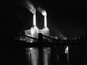 Battersea power station in London, illuminated at night at the time of