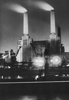 00166 Collection: Battersea Power Station at night July 1950, Coal ships unload at Battersea Power Station
