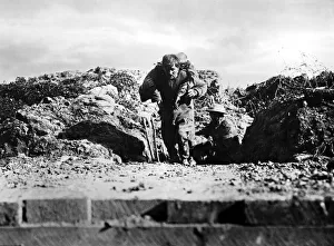 Battle of Albert: A wounded man of the 29th Division being brought in across a sunken