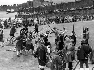 Acting Prints: Battle re-enactments - Members of the English Civil War Society armed with muskets