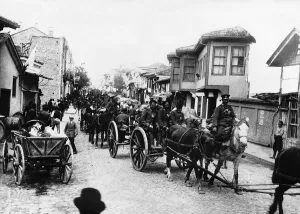 Former Yugoslavia Prints: Bavarian soldiers passing through a Serbian town 1916 World War One