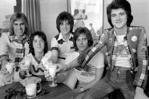 Bay City Rollers (Non-Drinkers) toast their success with milk. L. to R