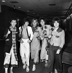 Images Dated 6th January 1977: Bay City Rollers. 'The Bay City Rollers'leaving Heathrow airport for Los