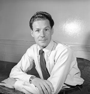 BBC Announcer Alexander McIntosh seen here at home. Circa 1957