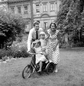 BBC Announcer Alexander McIntosh seen here at home with his wife and children. Circa 1957
