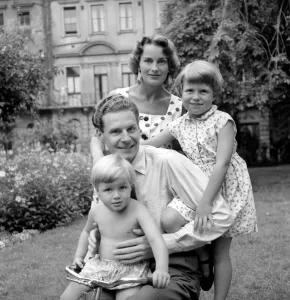 BBC Announcer Alexander McIntosh seen here at home with his wife and children. Circa 1957