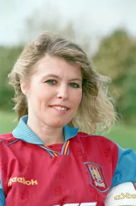 BBC Radio WM presenter Julie Mayer in an Aston Villa kit at the club