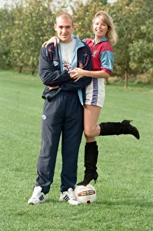 01077 Prints: BBC Radio WM presenter Julie Mayer in an Aston Villa kit with Villa midfielder Mark