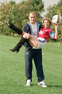 01077 Prints: BBC Radio WM presenter Julie Mayer in an Aston Villa kit with Villa midfielder Mark