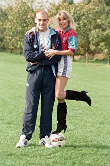 01077 Prints: BBC Radio WM presenter Julie Mayer in an Aston Villa kit with Villa midfielder Mark