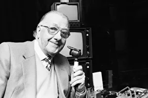 BBC snooker commentator Ted Lowe holding his microphone. 27th January 1986