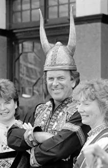 00503 Prints: BBC television chat show host Terry Wogan wearing a Viking helmet May 1986