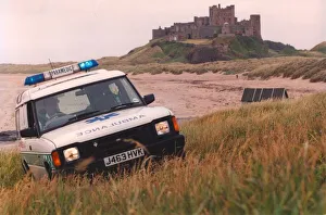 Beach combing - one of the new 4 wheel drive ambulances in action at Bamburgh Castle