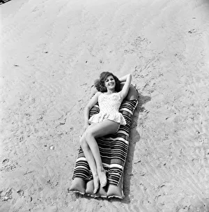 Beach Glamour: Having holiday fun in the sun at Minnis Bay near Margate, Kent