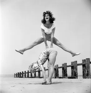 Beach Glamour: Having holiday fun in the sun at Minnis Bay near Margate, Kent