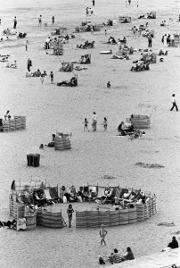 Coastal Prints: Beach scenes in Ramsgate. Holidaymakers in a village circle