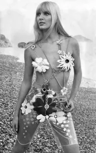 Beachwear fashions. Swimsuit designer Jean Voigt thinks that back views have been too