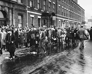 Beatlemania - Its October, 1963, and long lines of Beatles fans queue around