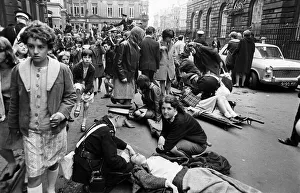 The Beatles 10 July 1964 Crowds of fans line the streets in Liverpool as they await