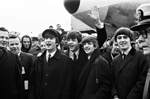 Group Shot Prints: The Beatles arrive in New York for a 10-day tour on Pan Am Flight 101 at Kennedy Airport