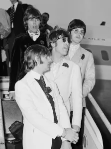 The Beatles arriving at London Heathrow Airport after their last ever concert tour of