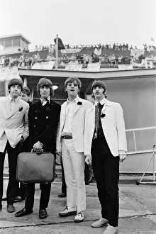 The Beatles arriving at London Heathrow Airport after their last ever concert tour of