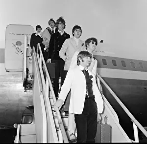 The Beatles arriving at London Heathrow Airport after their last ever concert tour of