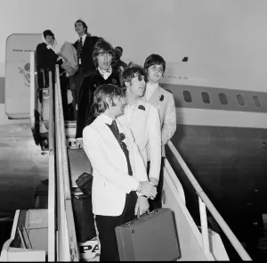The Beatles arriving at London Heathrow Airport after their last ever concert tour of