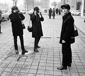 Photography Prints: The Beatles on the Champs Elysees before Ringo arrived in Paris later in the day