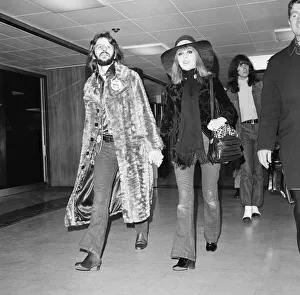 Jeans Prints: Former Beatles drummer Ringo Starr at Heathrow airport with his wife Maureen en route