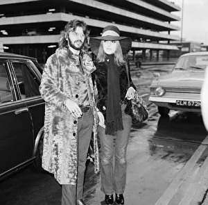 Former Beatles drummer Ringo Starr at Heathrow airport with his wife Maureen en route