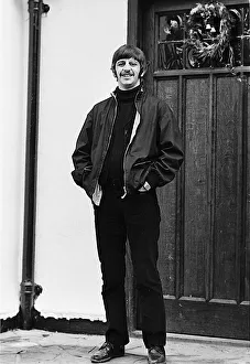 Beatles drummer Ringo Starr outside his home in Weybridge after being served with a writ