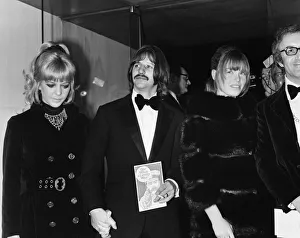 Tuxedo Prints: Beatles drummer Ringo Starr with his wife Maureen attend the film premiere of Oh What A