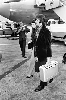 Beatles drummer Ringo Starr with wife Maureen at Heathrow today