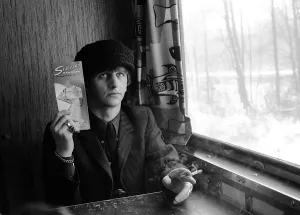 The Beatles February 1964 Ringo Starr holding Seaboard railroad card on the train