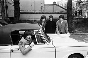 Images Dated 18th July 2014: The Beatles February 1965 John Lennon passes his driving test
