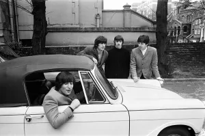 Core08 Prints: The Beatles February 1965 John Lennon passes his driving test