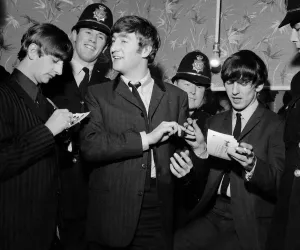 Beatles files 1963 The Beatles Ringo Starr John Lennon & George Harrison sign