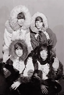 Group Portrait Prints: Beatles group shot wearing eskimo outfits December 1964 Top row George Harrison