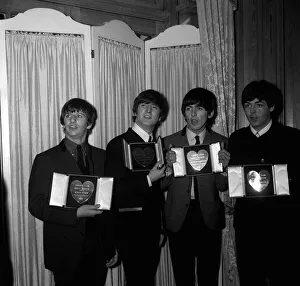 The Beatles hold their Silver Heart awards as Show Business Personalities of