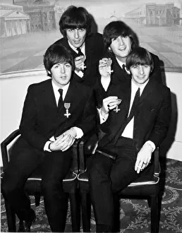 01227 Collection: The Beatles holding their MBE s. (Members of the British Empire
