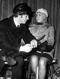 00170 Prints: The Beatles - John Lennon pictured with his wife Cynthia in the lounge of London airport