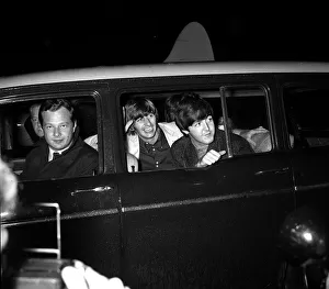 The Beatles July 1964 Paul McCartney and Ringo Starr greet fans as they arrive