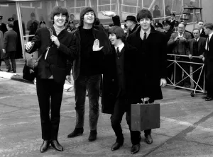 The Beatles leave London Airport bound for the Bahamas to commence filming on their
