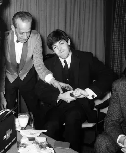 The Beatles leaving for New York. Paul McCartney before boarding the aircraft 7 February