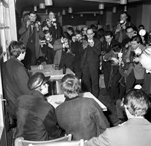 Beatles left to right: Paul McCartney, John Lennon and George Harrison at a press