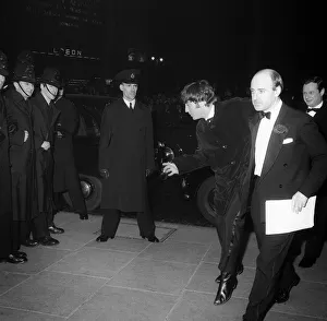 The Beatles March 1964 John Lennon makes some funny moves as the group arrive