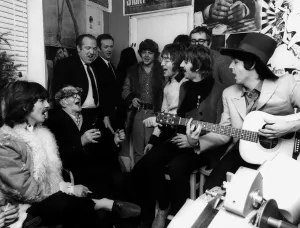Beatlemania Prints: The Beatles in the Old Compton Street, Soho with street busker Bill Davis
